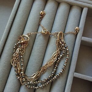 Anthropologie five layer gold tone bolo bracelet